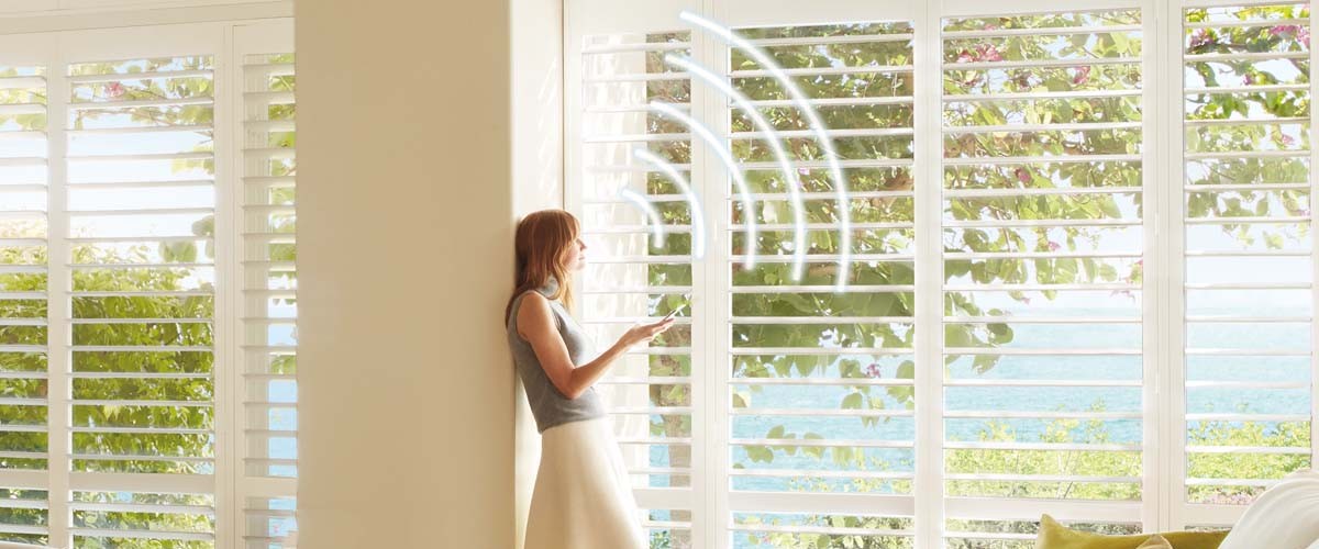 Palm Beach™ Polysatin™ Vinyl Shutters with PowerView® Motorization